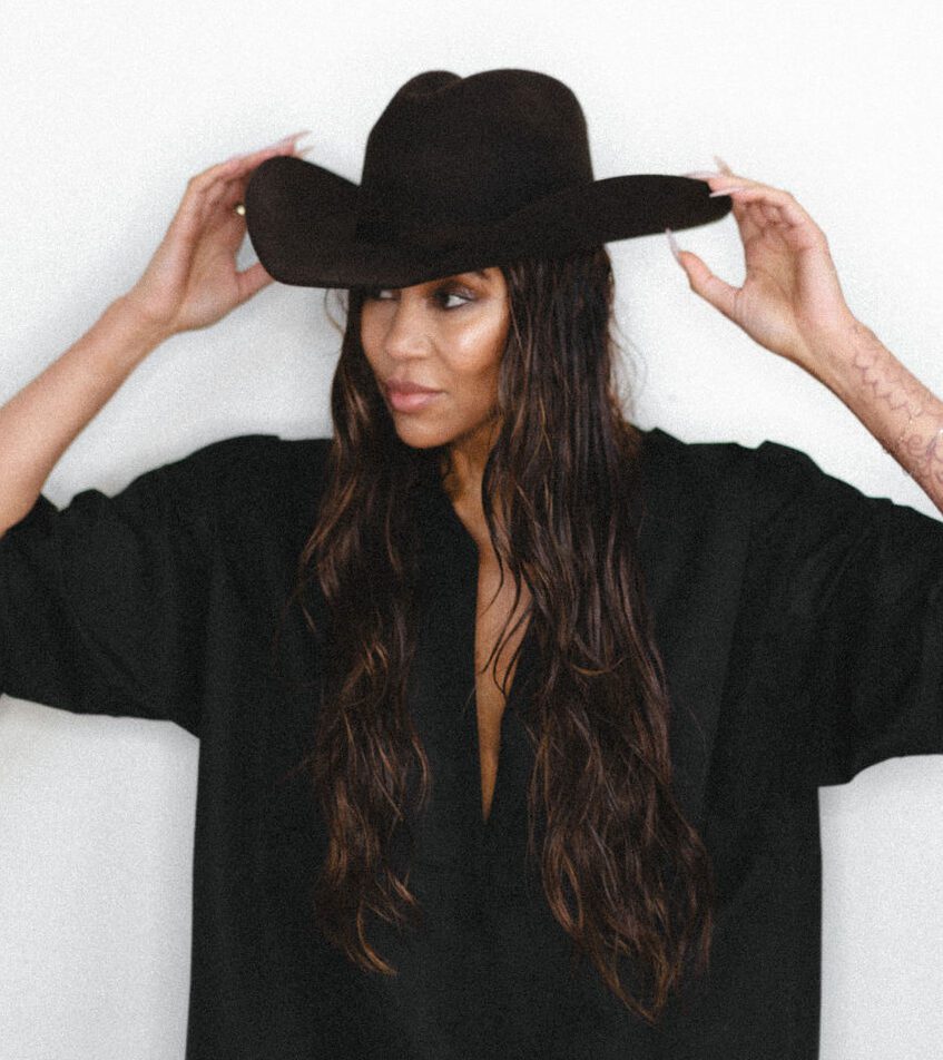 Garnish founder Candice Mot rocks a cowboy hat with extensions.