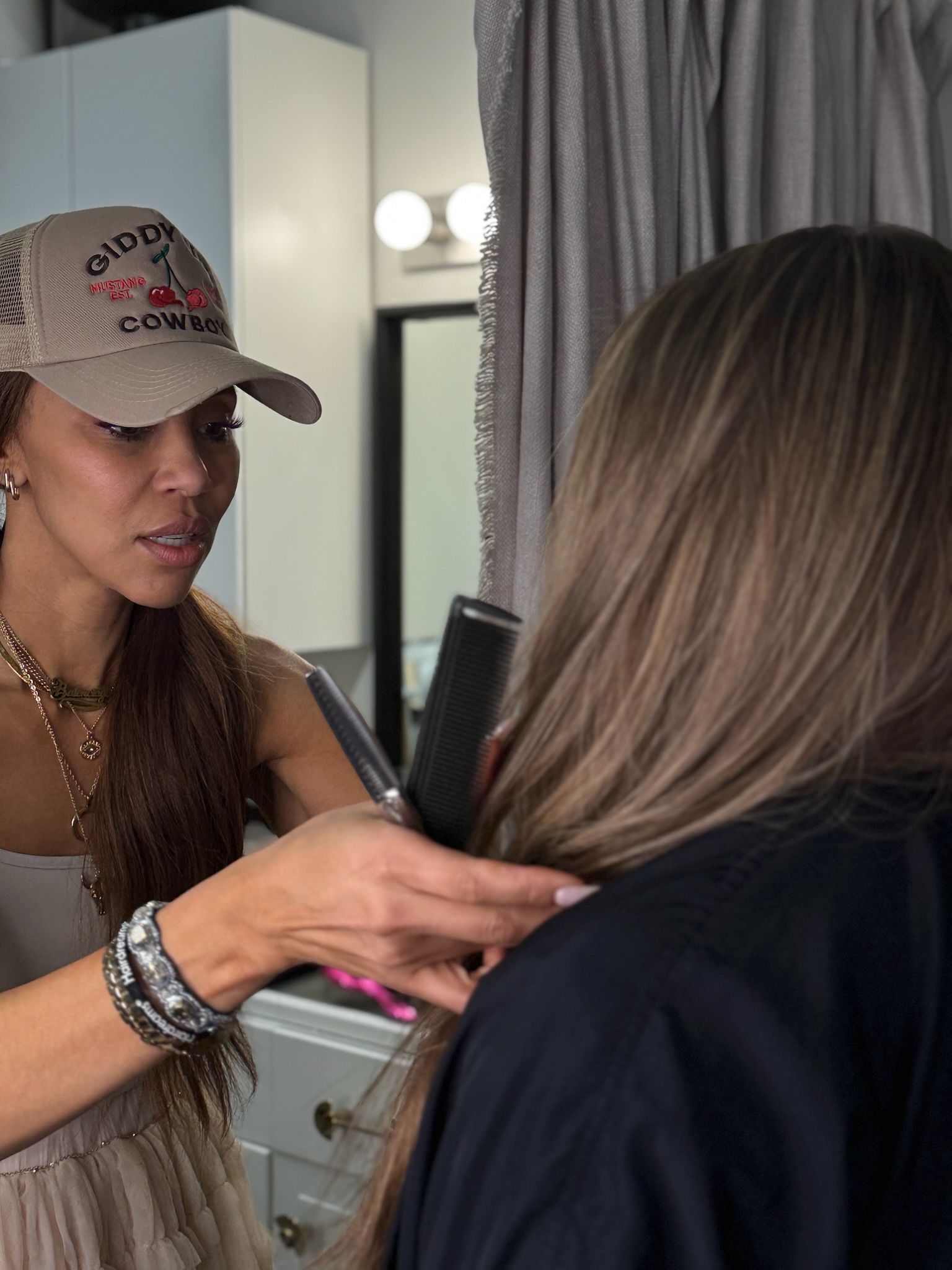 Garnish founder Candice Mot puts the finishing touches on a guest's custom crown at install day
