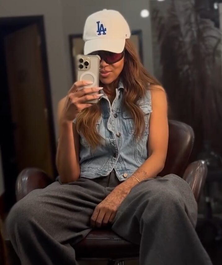 Garnish founder Candice Mot rocks an LA Dodgers hat with extensions.