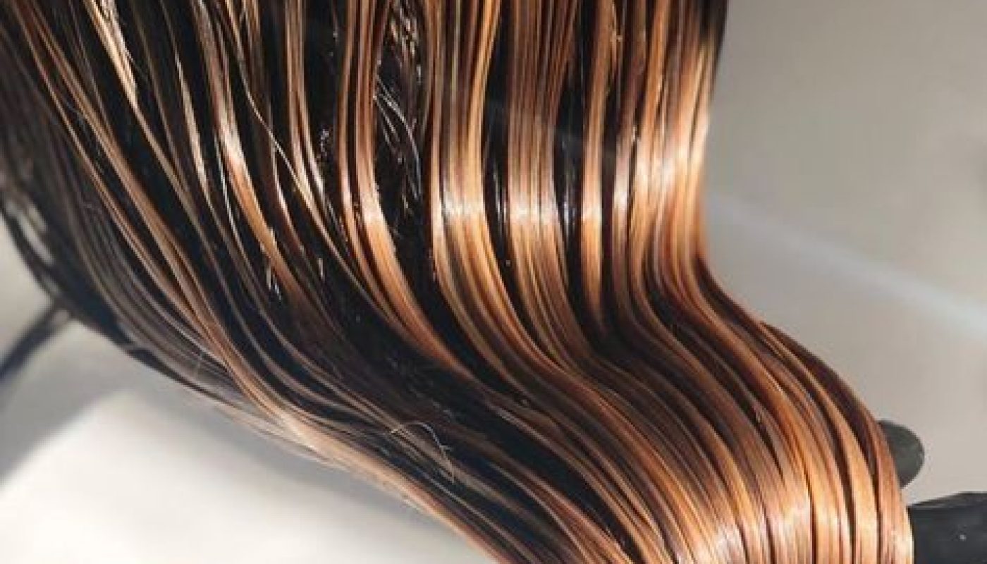 Hair being washed as part of a hair loss consultation after seeing a dermatologist